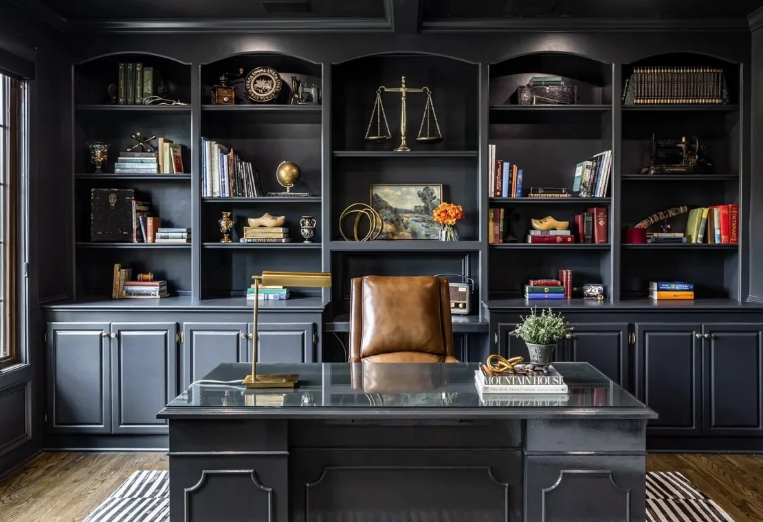 Our favorite part of designing the home office at Treyburn was learning the history and stories behind many of the pieces we displayed on the built-ins including - medical tools used by previous generations of physicians in the family, an antique sew