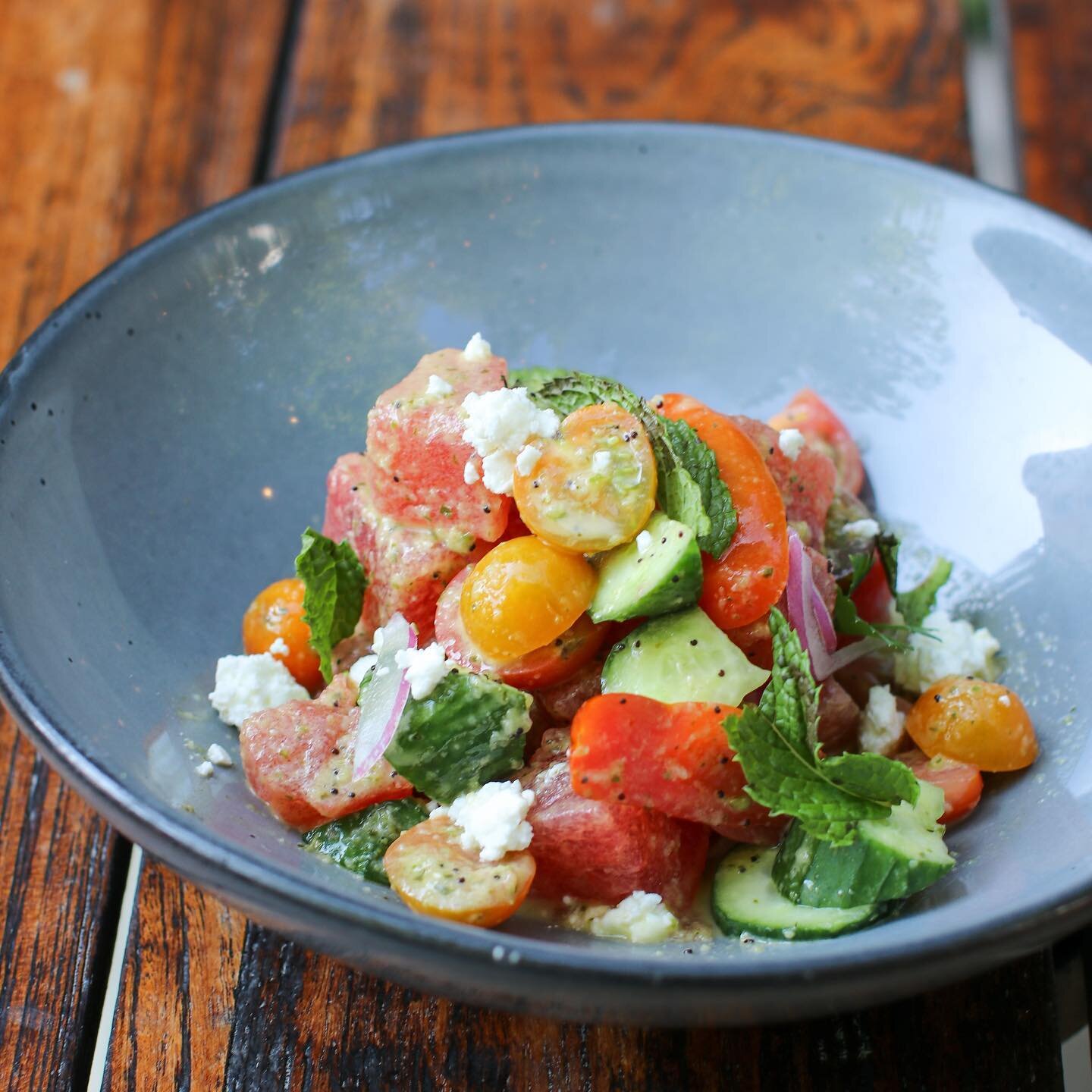 WATERMELON FETA SALAD 🍉 
basil vinaigrette, persian cucumber, feta, nichols cherry tomatoes, mint