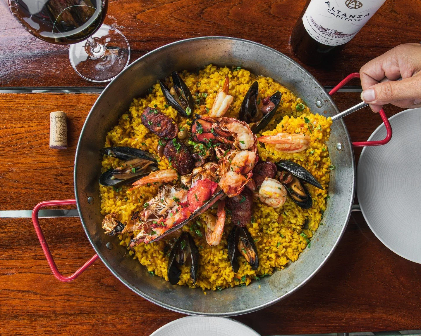 Built for sharing, our Dawson Paella combines seafood, chorizo, saffron-scented bomba rice, and charred lemon for a bold, wood-fired take on a classic. 🔥