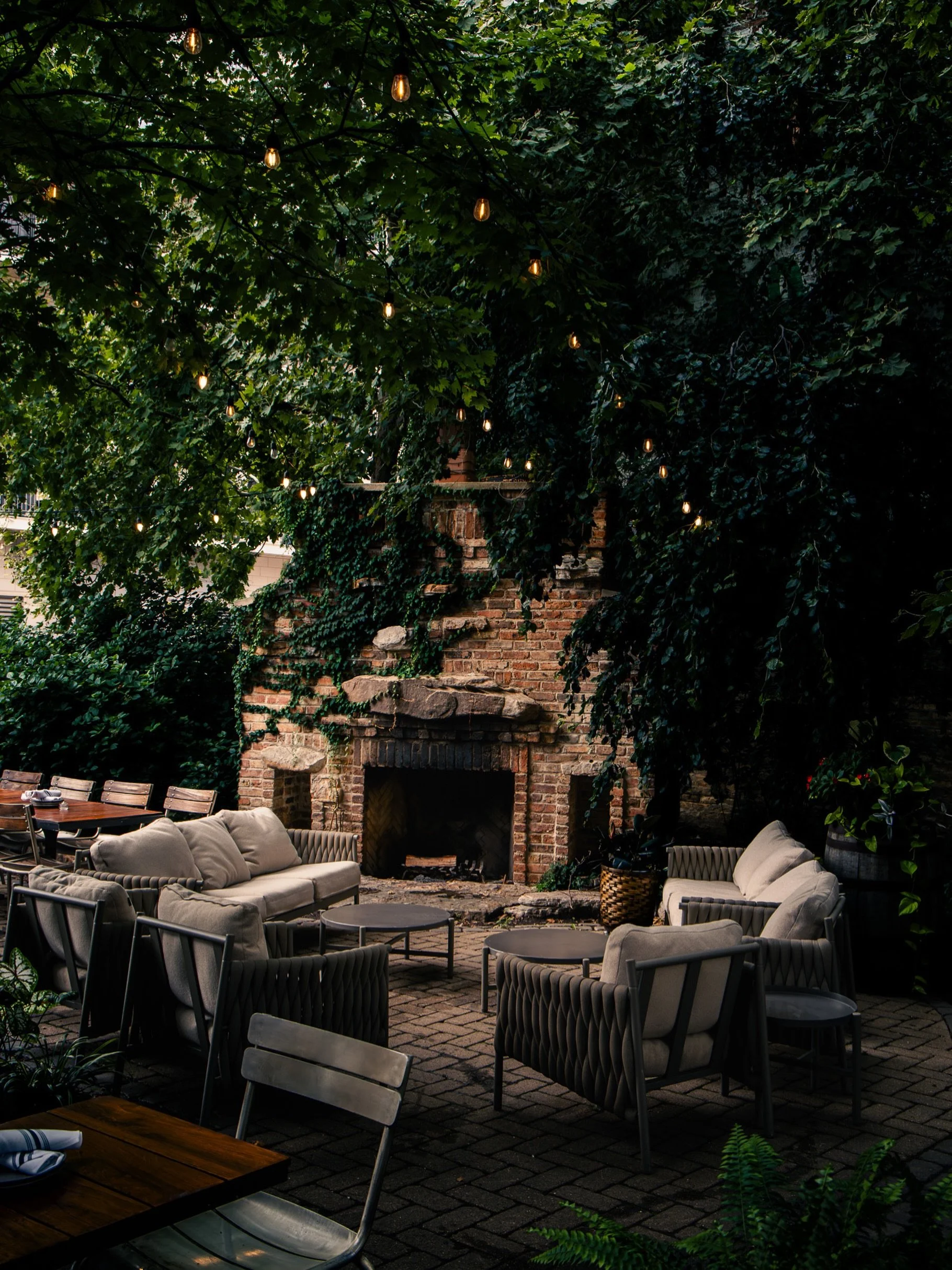 Some corners are made for settling in. Grab the group and claim a couch on the patio.