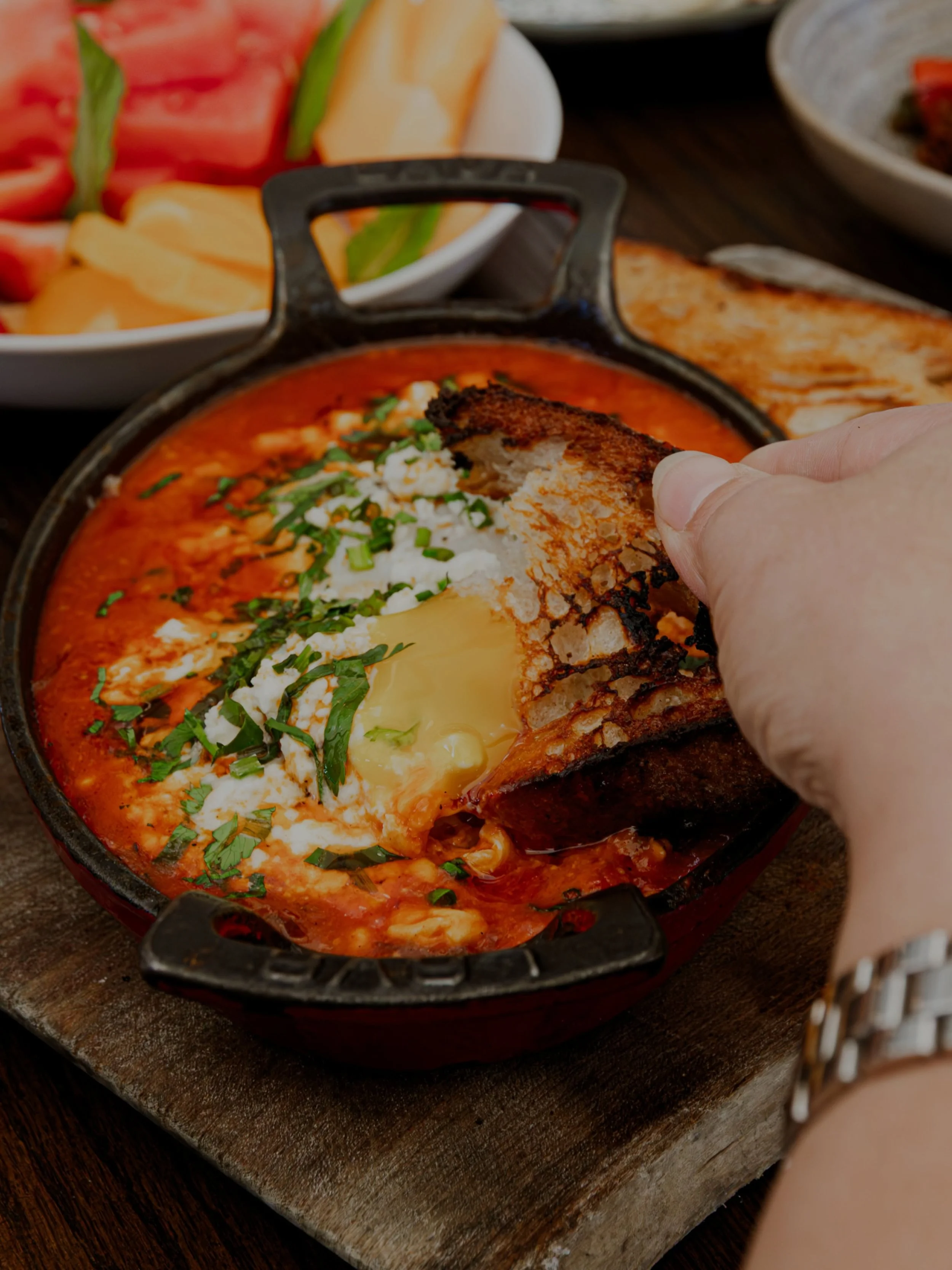 A little heat to start your Sunday. 🍳 Our Shakshuka brings together baked eggs, fire-roasted peppers, tomato, feta, fresh herbs, and chili oil. Toasted sourdough for the finishing touch.

Join us for brunch.