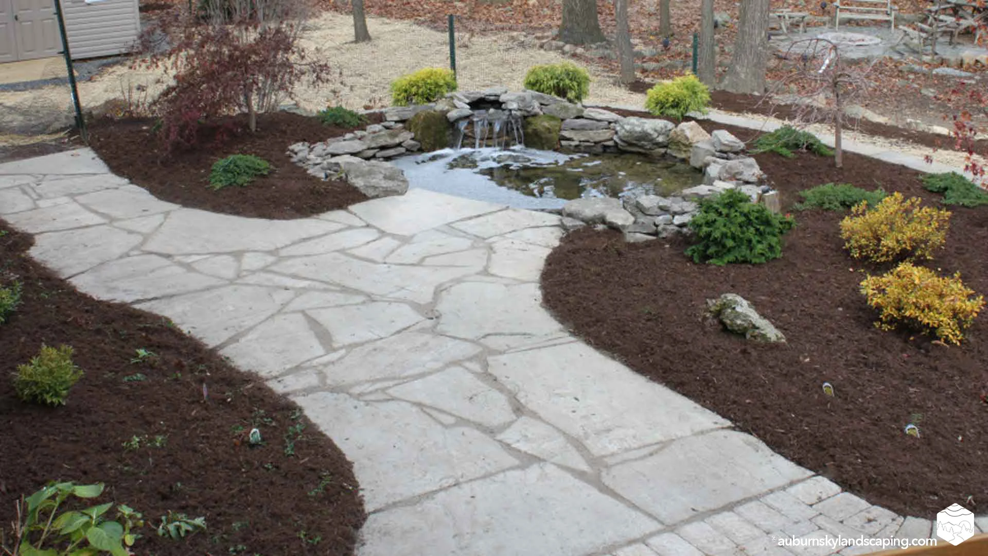 Auburn-Sky-Landscaping-Natural-Flagstone-Patio-Ecosystem-Pond.jpg