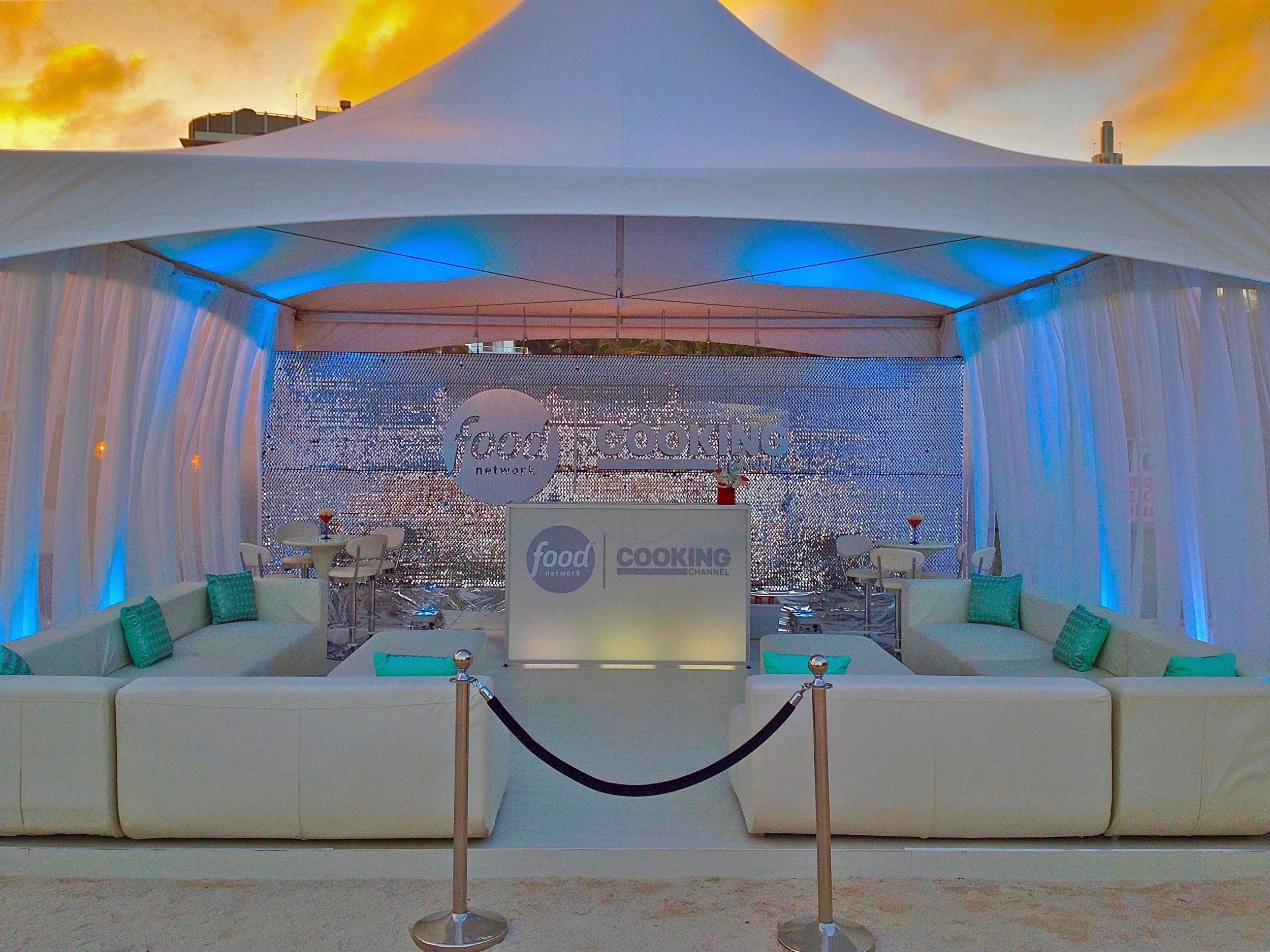 Branded food network tent with white lounge furniture.jpg