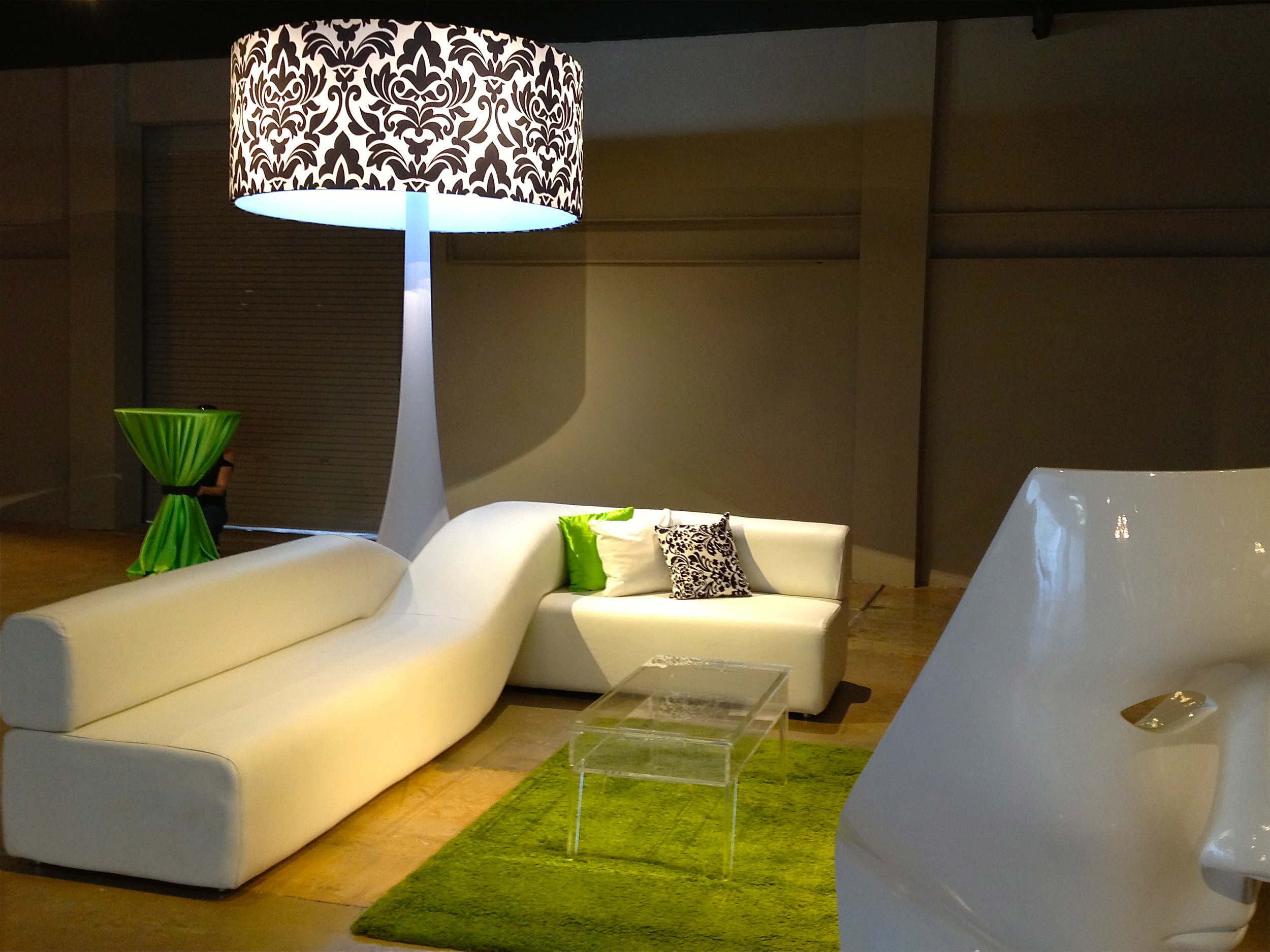 Tall freestanding lamps with white lounge sofa.jpg