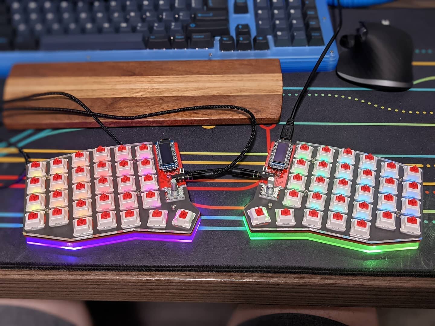 WIP RGB Sofle! It has per key and underglow RGB, kailh hotswap, OLEDs, and encoders on both sides

I'm almost done figuring out the last of the firmware changes and then it'll be all done! I'm hoping to have this for pre-sale this week in black and r