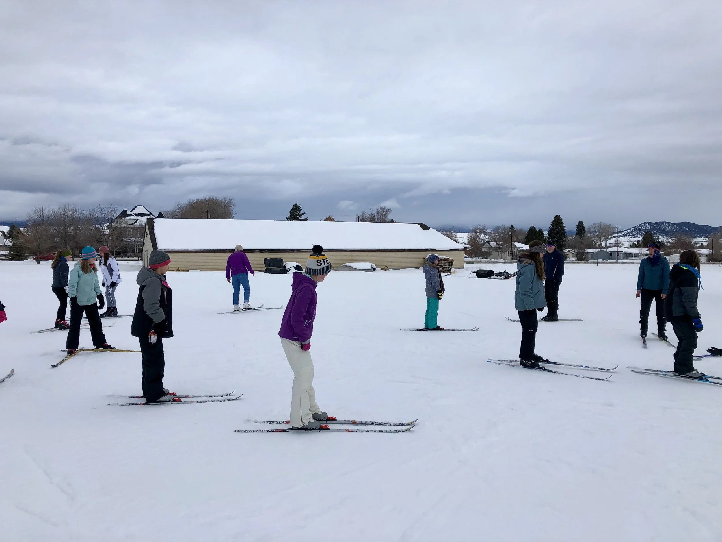 Girls learned to cross-country ski during the Winter 2018 session thanks to Carl and Andree Anderberg and the Base Camp .