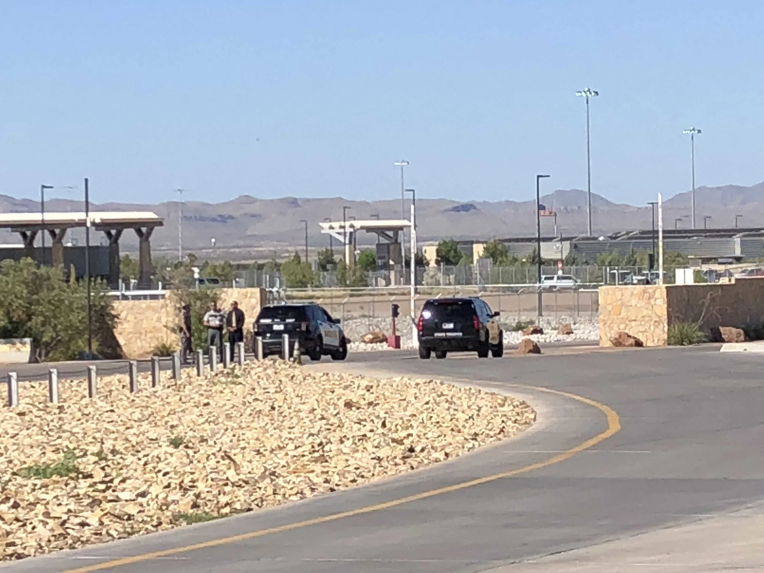 Same entry at 9am after the U.S. Conference of Mayors press conference began. Tx Dept of Public Safety SUV and a local police car.
