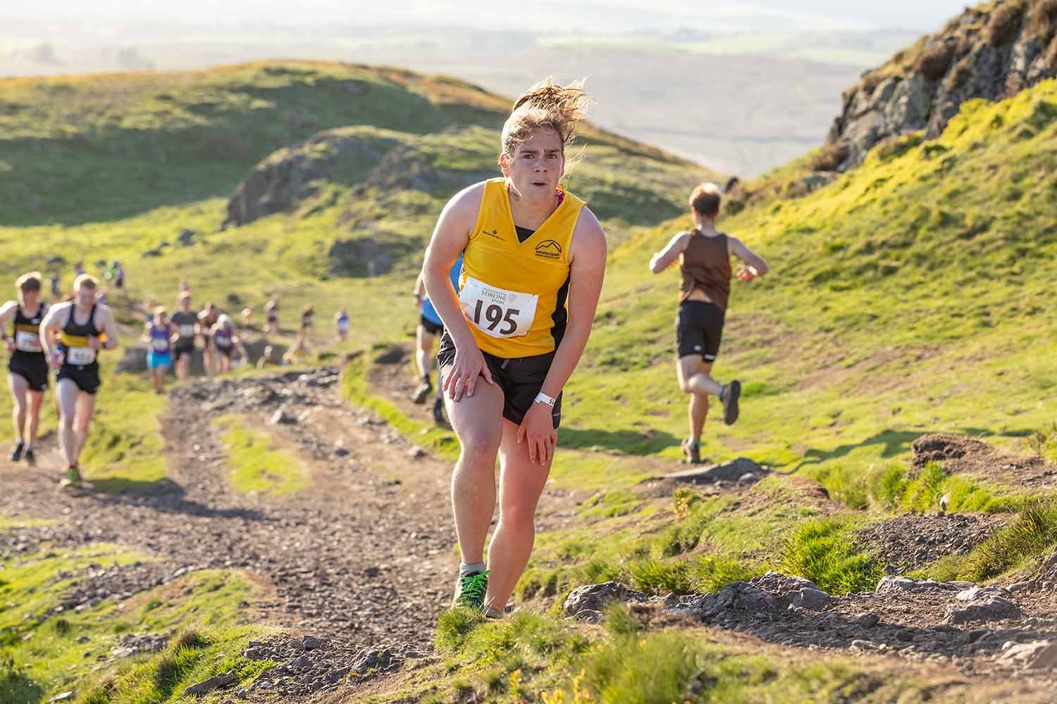 First female runner Dumyat Hill Race Stirling 2022.jpg