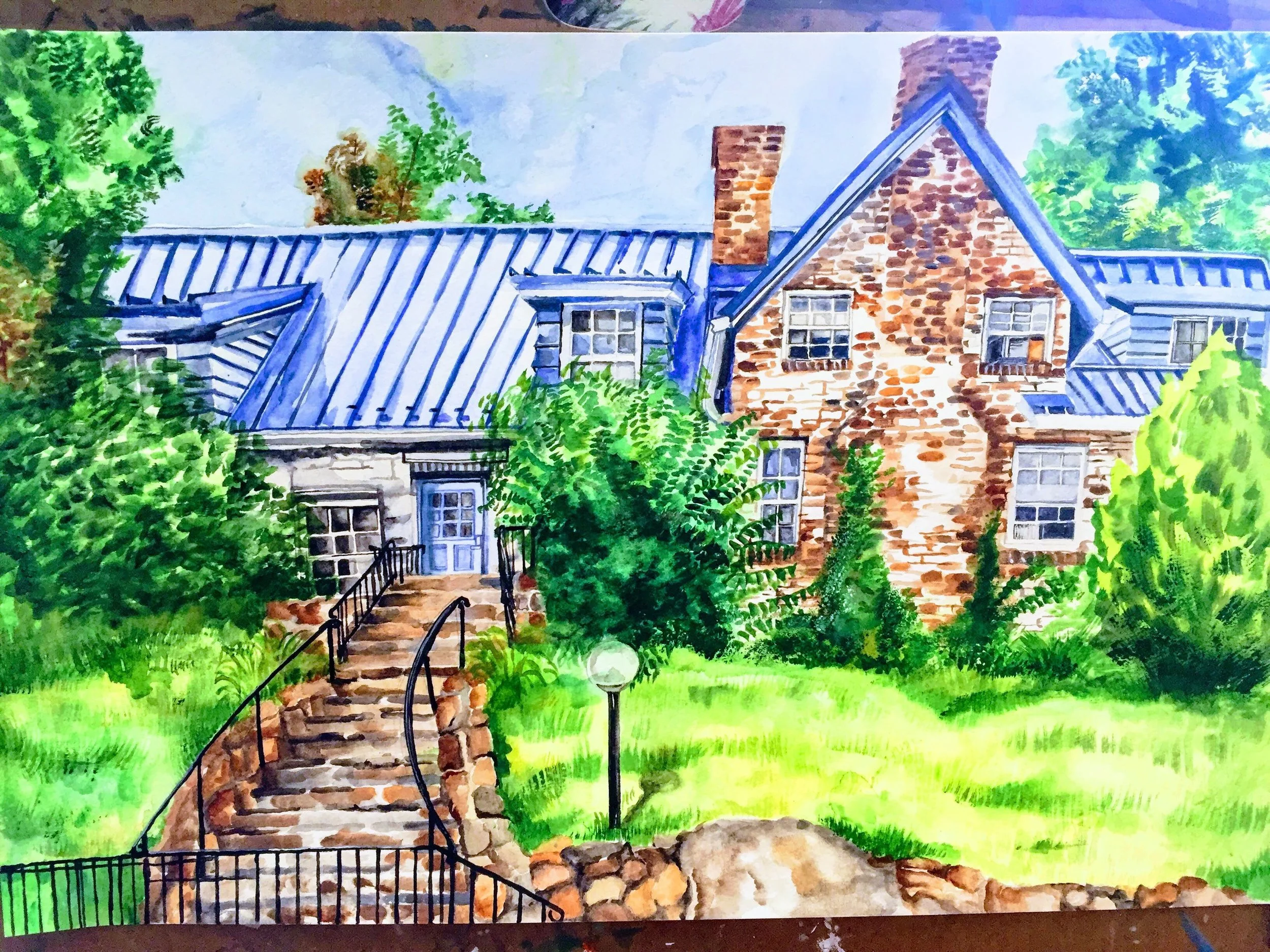 Anabel donated this painting she did of Blue Rock School which hangs in the Main Building entryway.