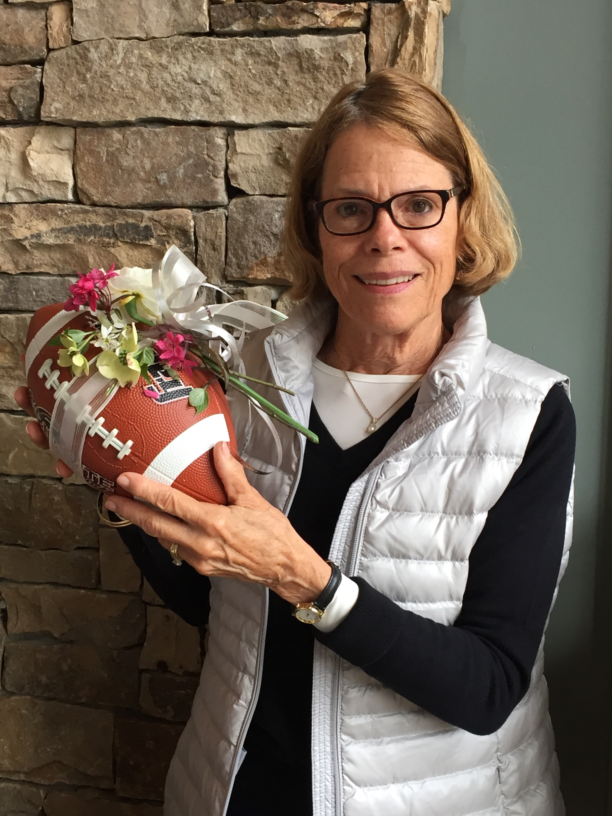 Judy Kaufman, gala chair, had teased the club with the promise of football meets flowers by way of a corsage-wearing football.