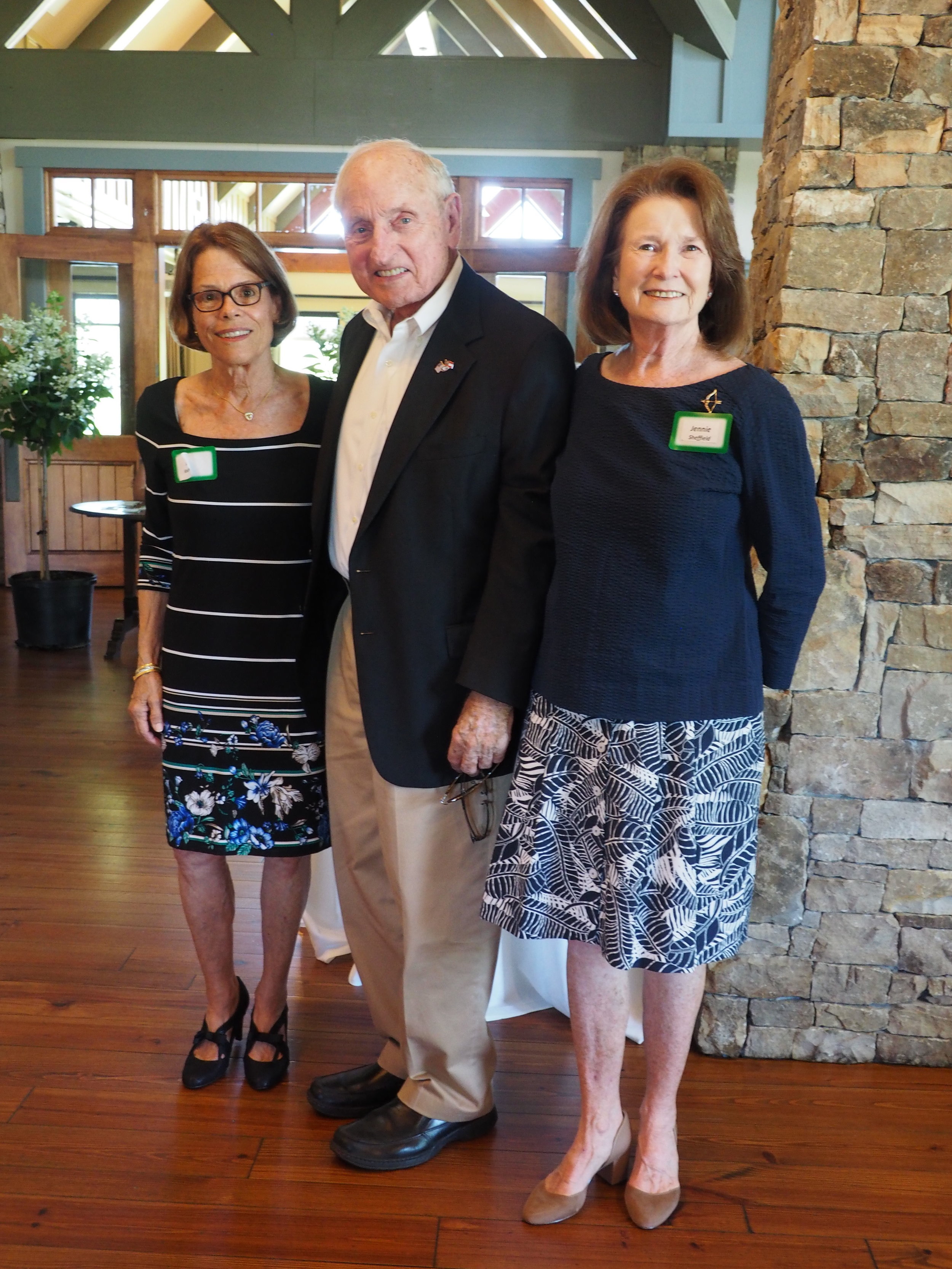 Judy Kaufman and Jennie Sheffield welcome a master of gardening and the former University of Georgia’s Coach Vince Dooley, guest speak for the WFB 25th Anniversary celebration.