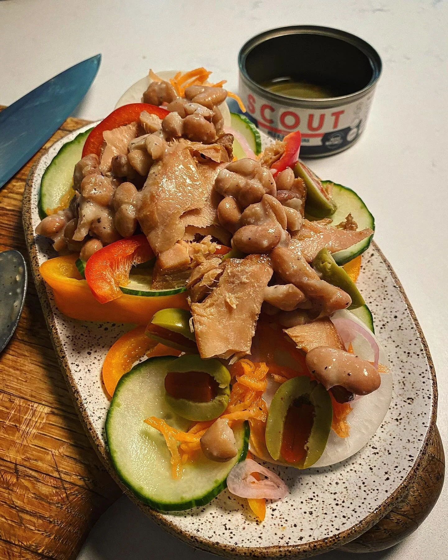 Classic Pantry Raid for lunch today with Scout smoked albacore tuna. Delicious, subtly smoky, and firm! Used the oil as the base for a simple vinaigrette to dress some random veggies. #tinnedthings #yeswetin