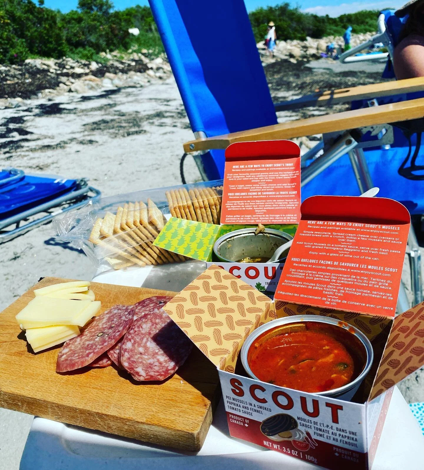 Crackers and tins and a plastic fork or two. Beach snacks done right!