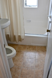 Refinished Tub and Installed Tile Floor