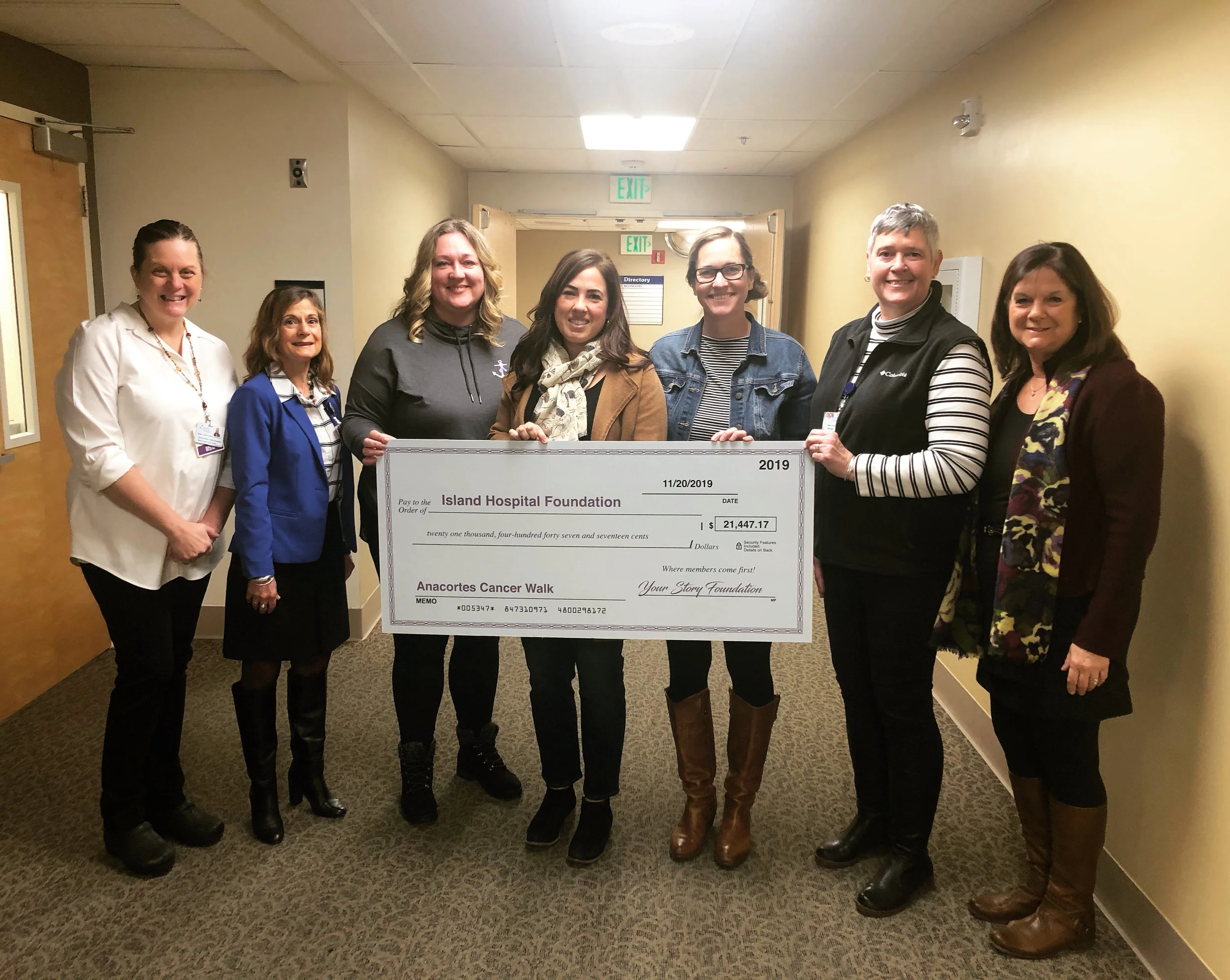 Your Story Foundation presents check to Island Hospital Foundation
