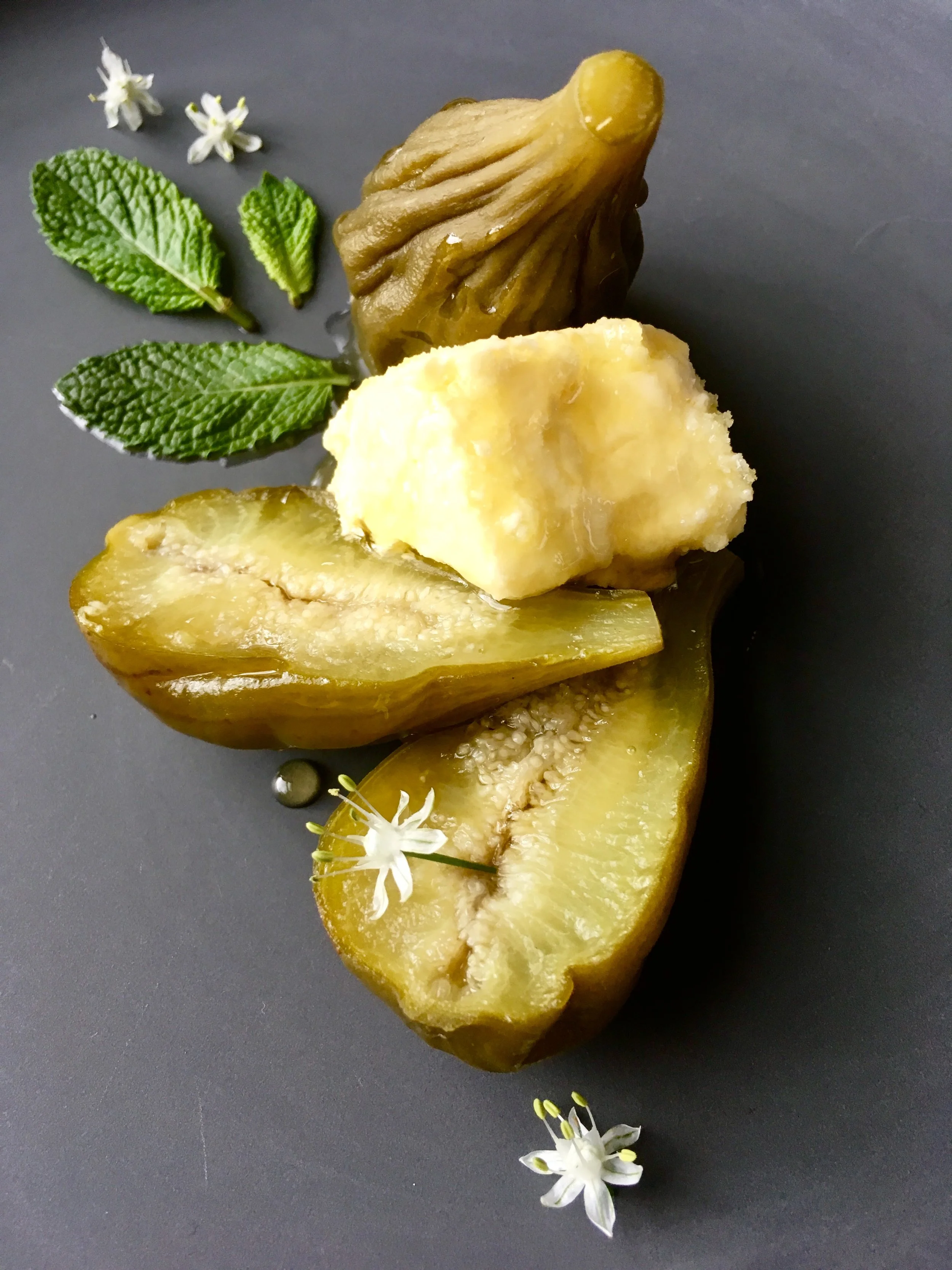 Pickled green figs w/ soft curd, honey & mint