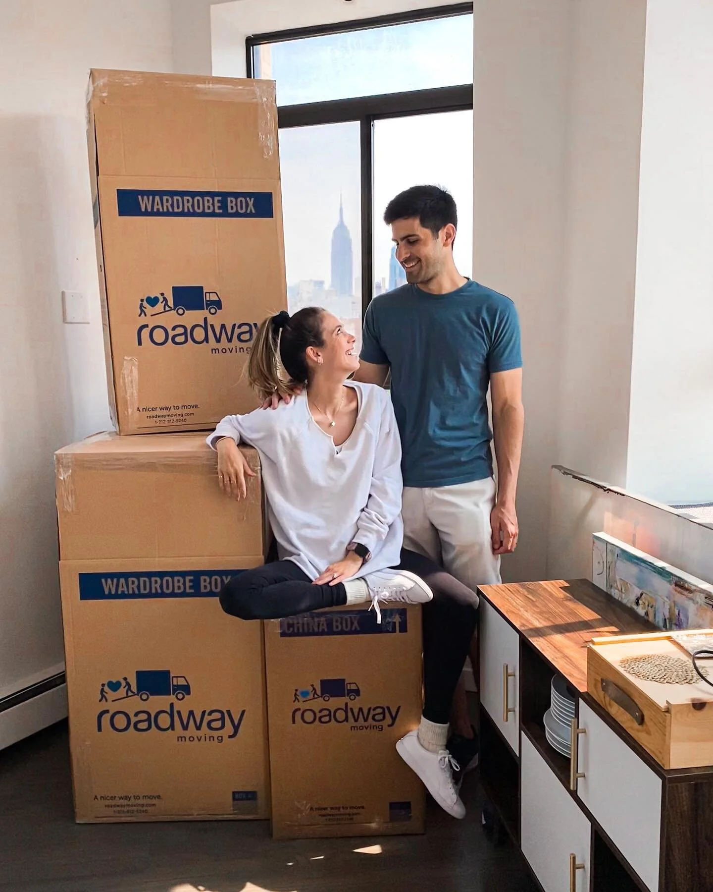WE'RE ALL MOVED INTO OUR NEW APARTMENT, THANKS TO @ROADWAYMOVING! 📦  We said goodbye to this stunning @empirestatebldg view and swapped it for a peaceful garden view...as our family grows, our space is growing with it, and we've chosen a quieter NYC