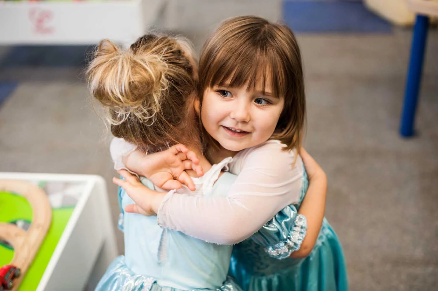 girls-hugging-dress-up.jpg