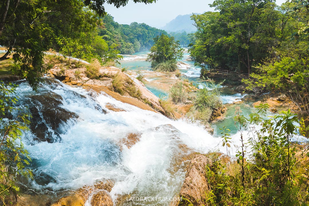 You need to pack three things for Agua Azul day trip - a sunscreen, swimsuit, and camera.