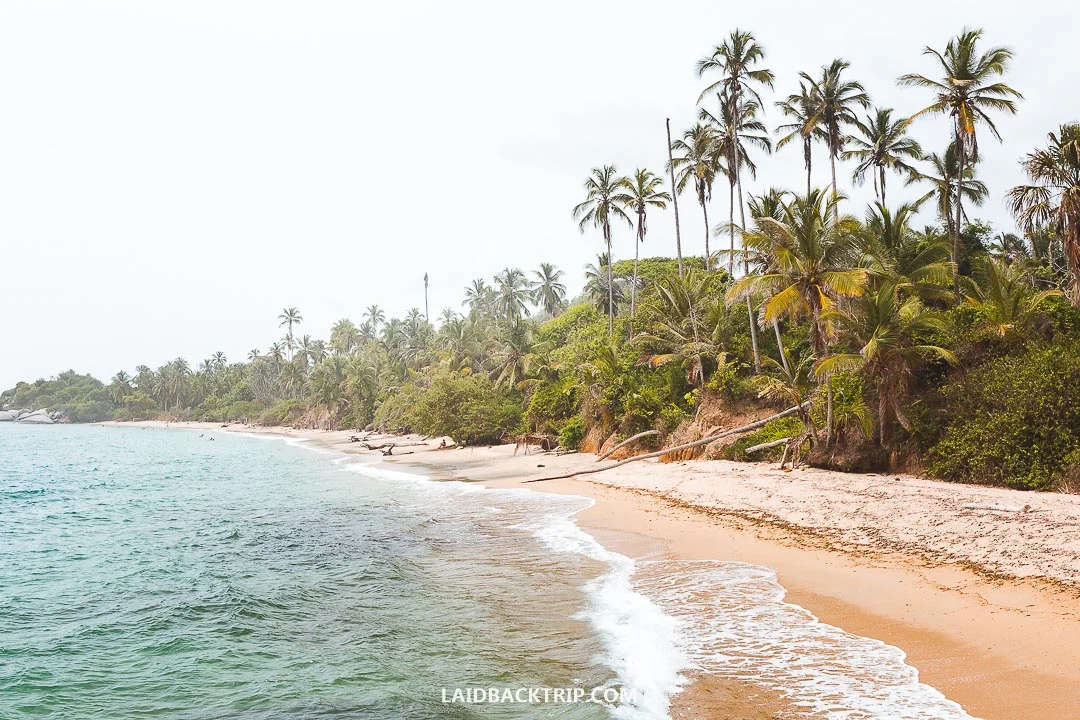 Tayrona National Park in Colombia is all about sandy beaches, water activities, and jungle forest.