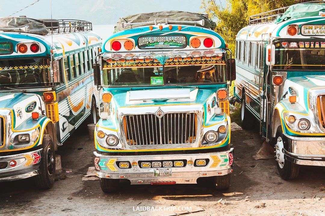 You can take a local chicken bus if traveling from town to town at Lake Atitlan.
