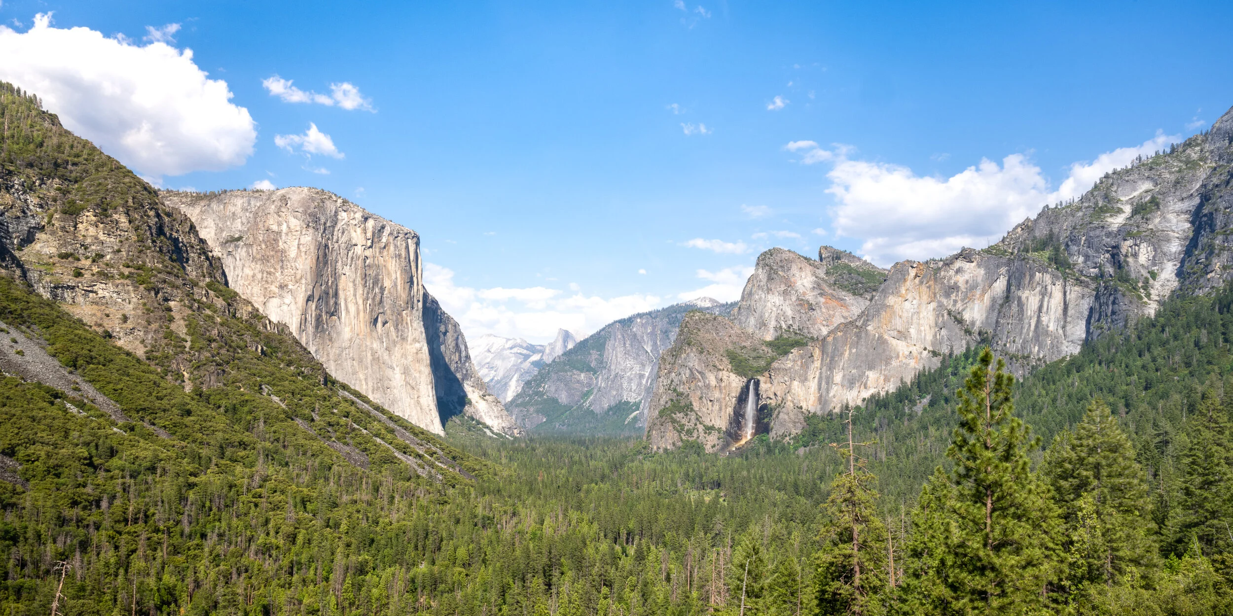 Tunnel View Overlook in Mid-Afternoon - El Capitan (left), Half Dome (center rear), and Bridalviel Falls (right). 