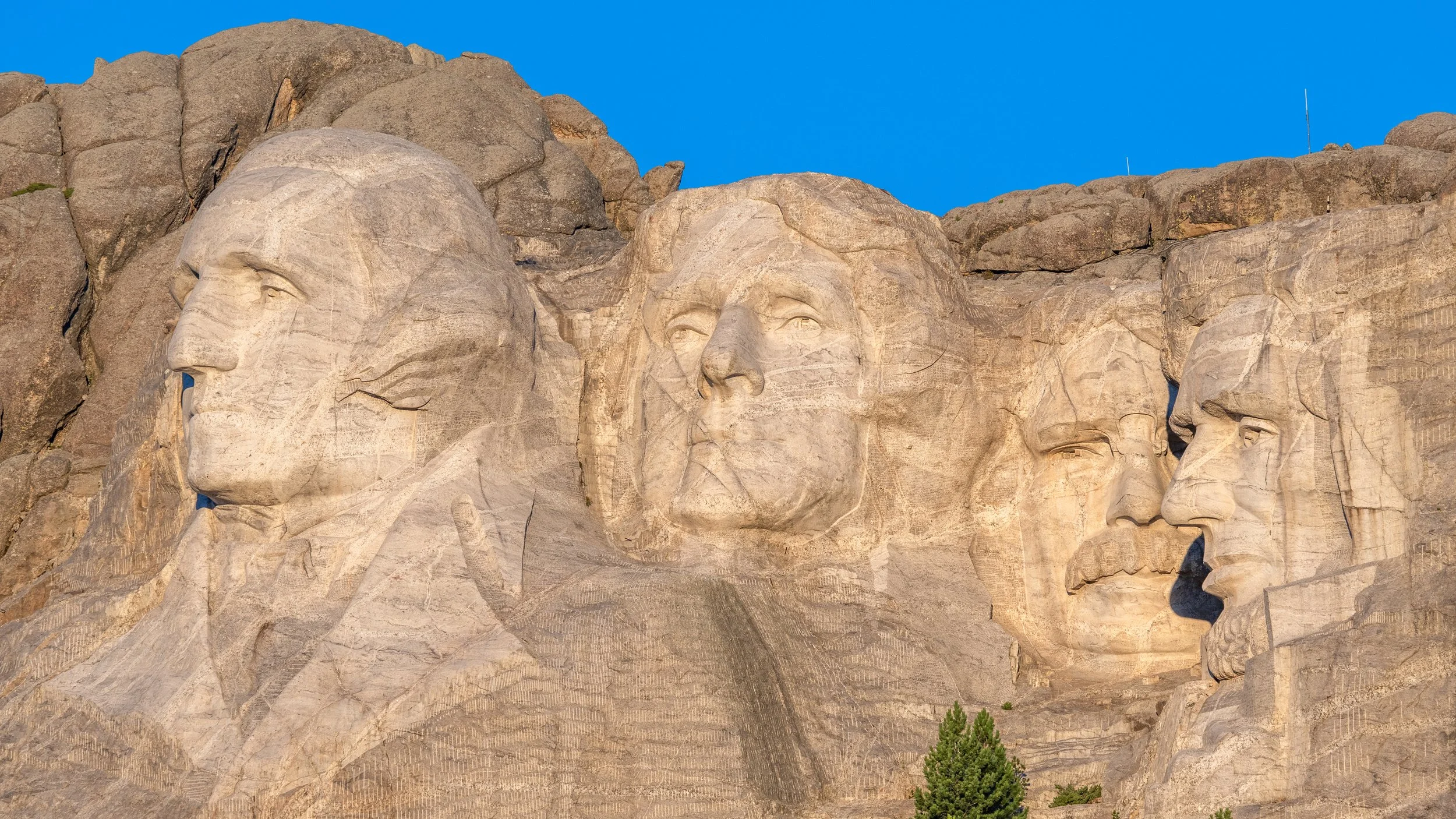 Approaching Mount Rushmore Just After Sunrise - Closeup of the Presidents