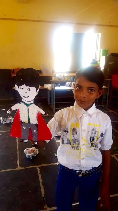 Of children, self-portraits, paint, mud, sticks and stones