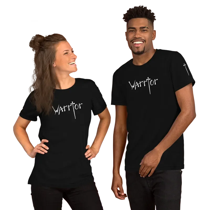A woman and a man standing together, both smiling, wearing black T-shirts with the word 'Warrior' written on their chest