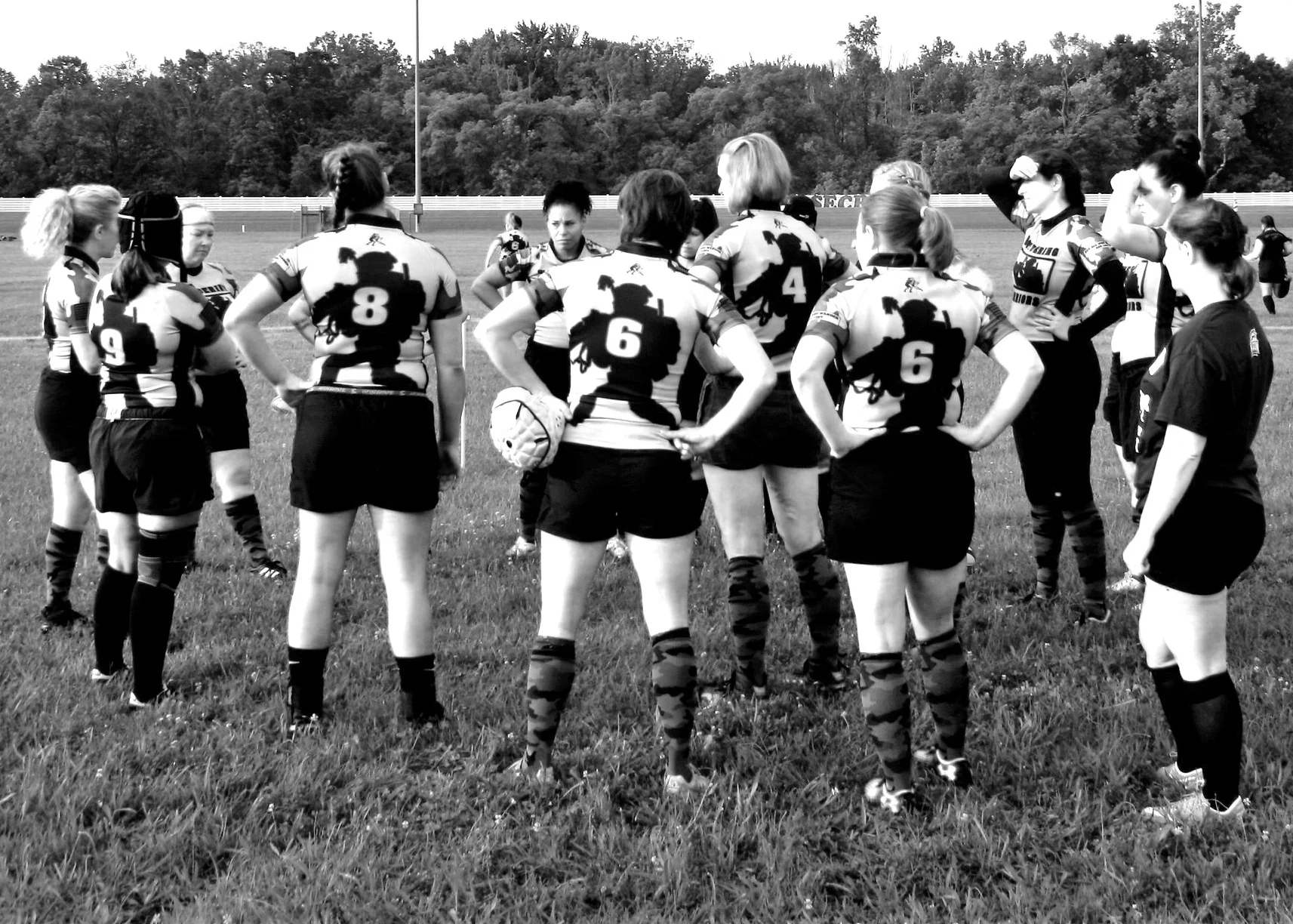 Photo Credit - Allana Mitchell Wandering Warriors Women discuss strategy pregame Honor Cup 2018 - Rosecroft Raceway