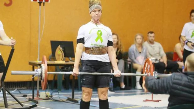Fire Investigator Jess Johnson dead lifts during the event raising money for Starship Hospital's research into mitochondrial disease.