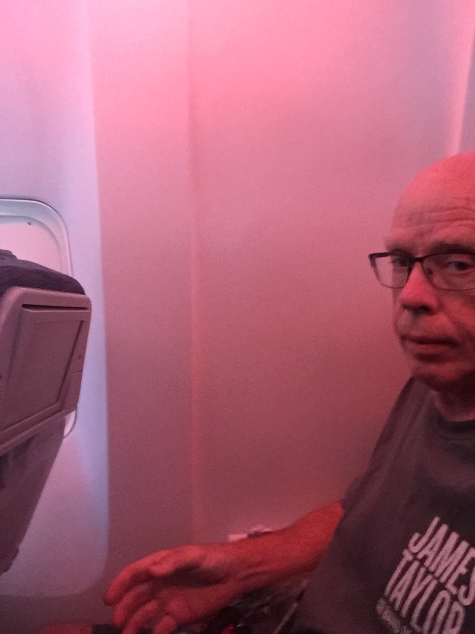 PJ sulking in an Air Canada “window seat”