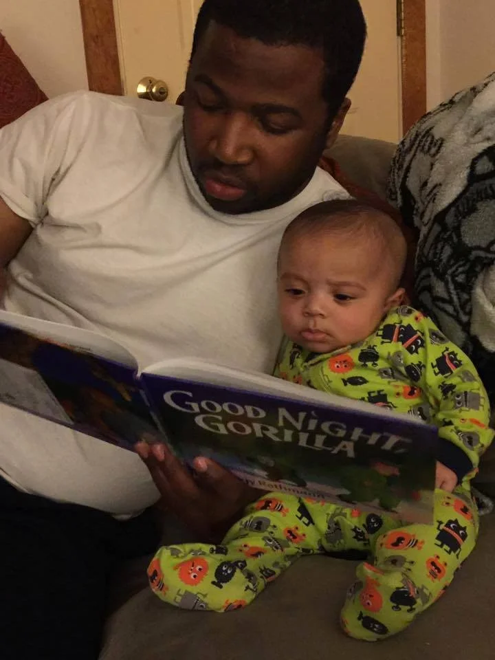 Black daddy infant.jpg