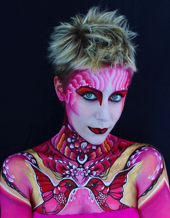 Pink bird face and body art by Brierley Thorpe.PNG