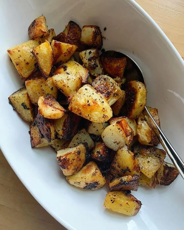 these greek lemon potatoes!! so simple with the most incredible results!! peel and chop 7 yukon golds and place on a rimmed baking sheet with 1/2 cup chicken broth, 1/2 cup lemon juice, and 1/2 cup olive oil. season them with oregano and S&amp;P befo