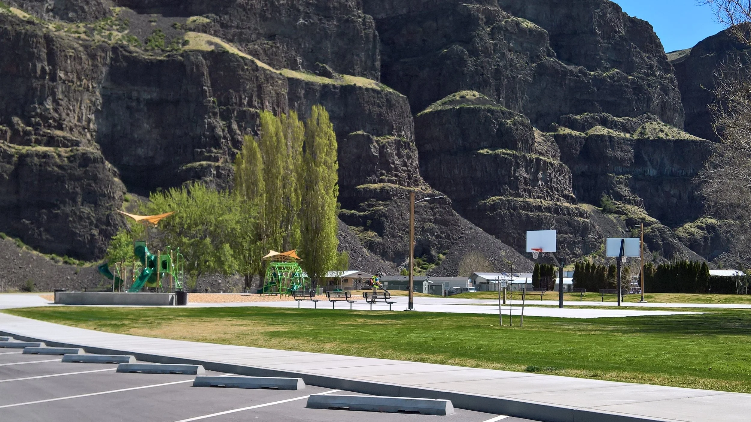 Riverbend Park play area and basketball hoops