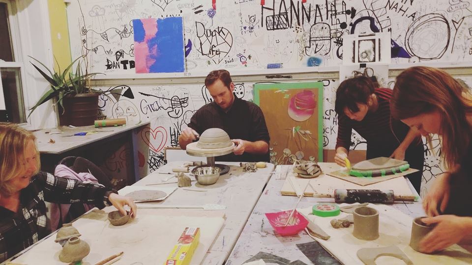 adults working on ceramics.jpg