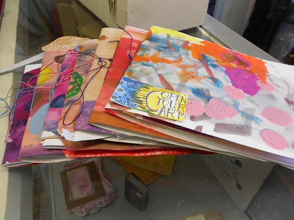 beautiful tiny painted bound books.jpg