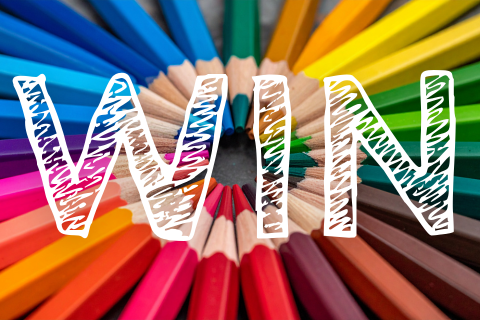 IMAGE OF COLOURING PENCILS WITH THE WORD 'WIN' ON IT