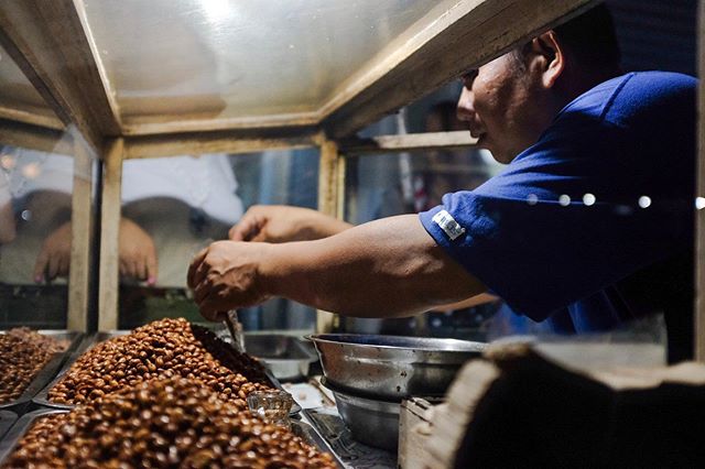 Pilipino street vendor. One of my favorite part of traveling is to see how workers are similar to those in the US.