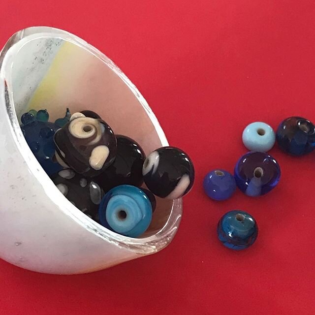 Spilling the beads. Beads from a long-ago workshop and my latest little recycled bowl. #irenefunnell.com