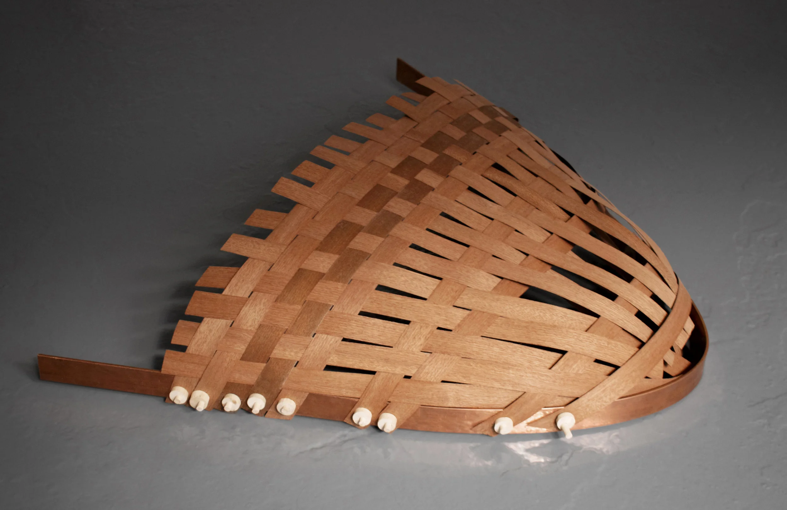 Bring me to The River and I will Follow Weaved Sapele veneer on bent copper and wooden clamps. 63 x 56 x 10 cm. 2019