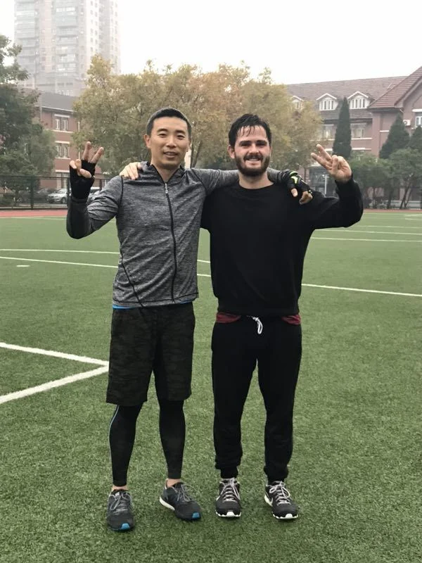 Alfie (right) at Sino-British College, Shanghai