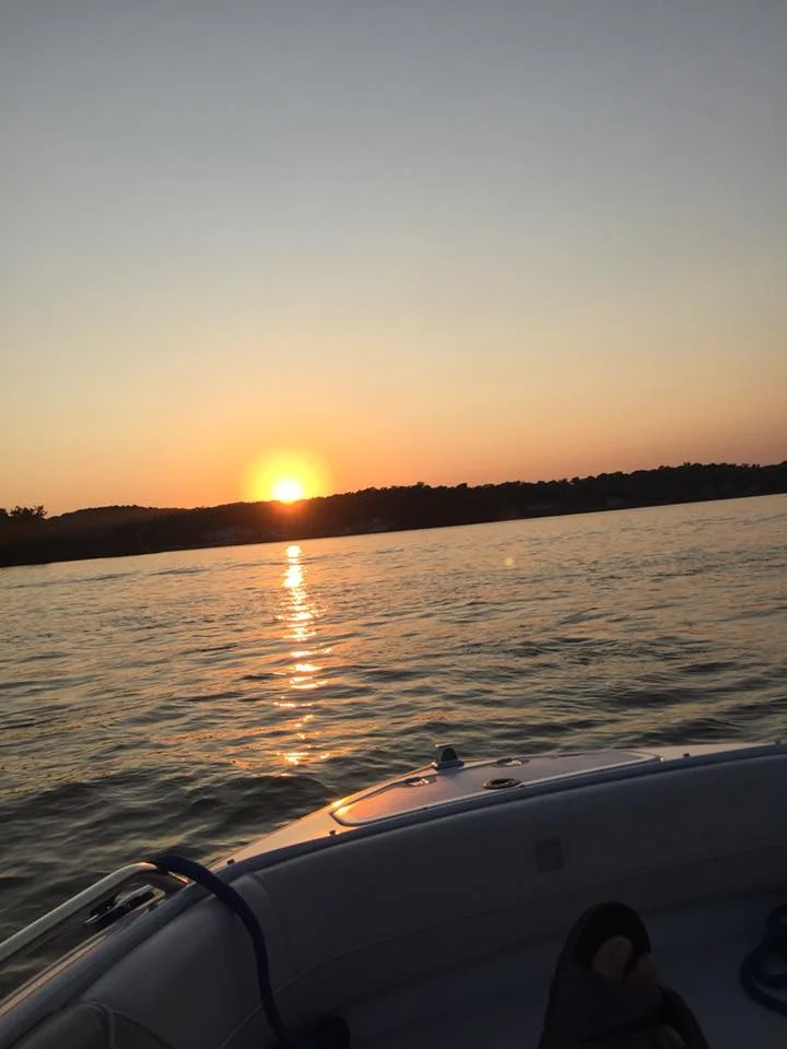 IMAGE OF SUNSET FROM BOAT