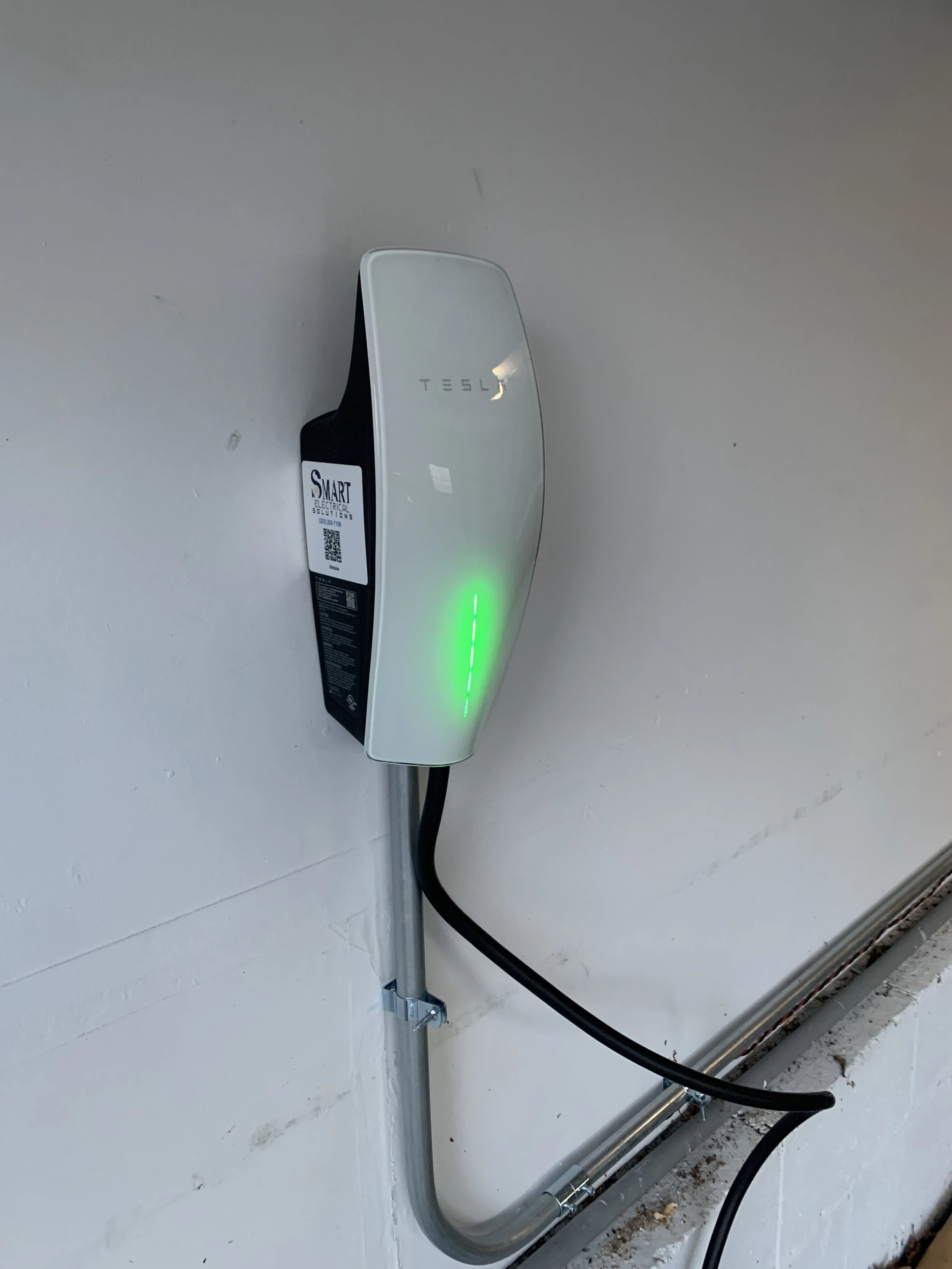 Tesla with exposed pipe .jpg