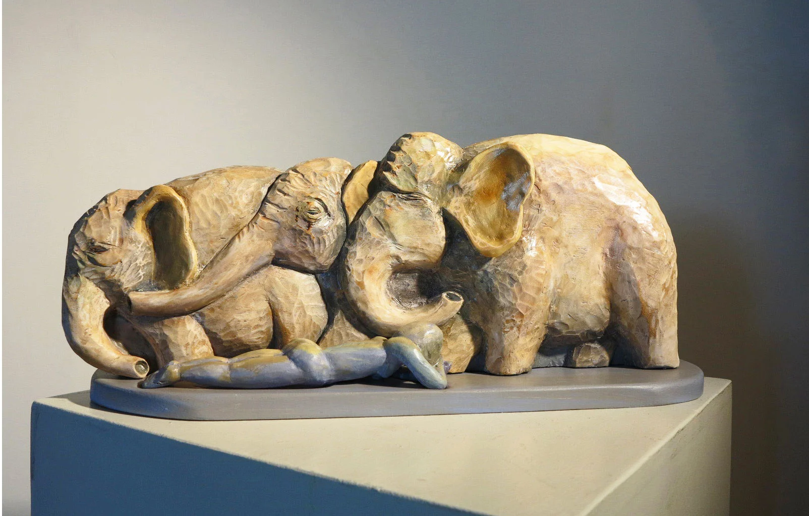 Dreaming Elephants carved and painted wood 9" x 21" x 5" Inquire >