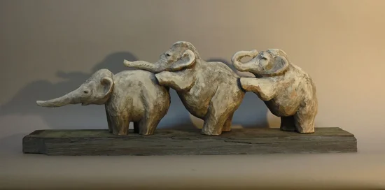 Elephant Trio, 2013 carved and painted basswood 25” x 9” x 5”