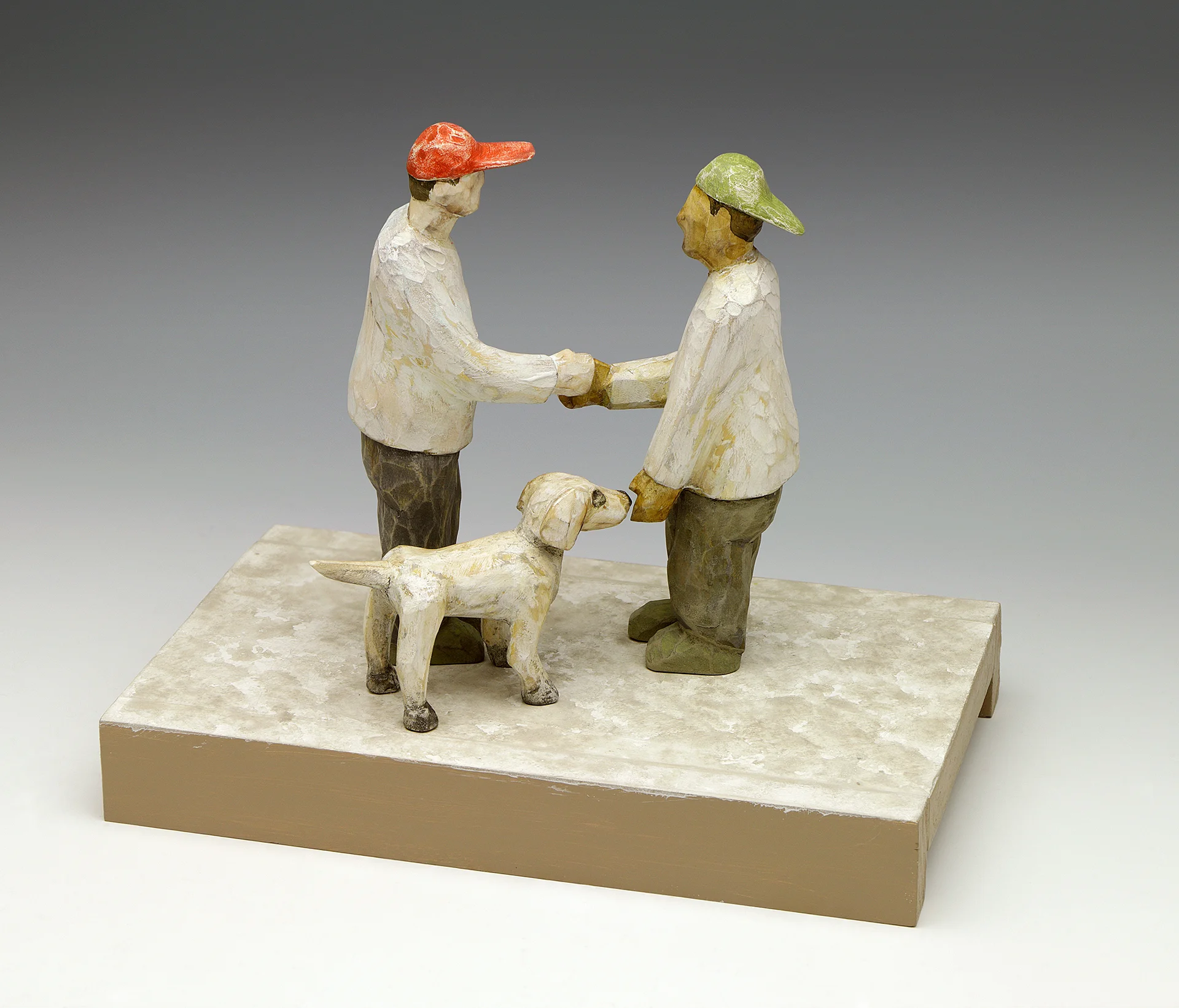 Handshake carved and painted wood 9.5” x 11” x 7”, 2018