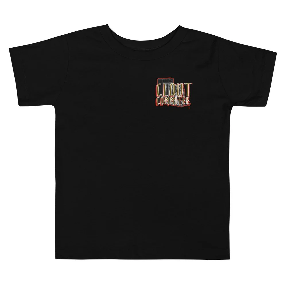 toddler-staple-tee-black-front-61966bccbbaeb.jpg