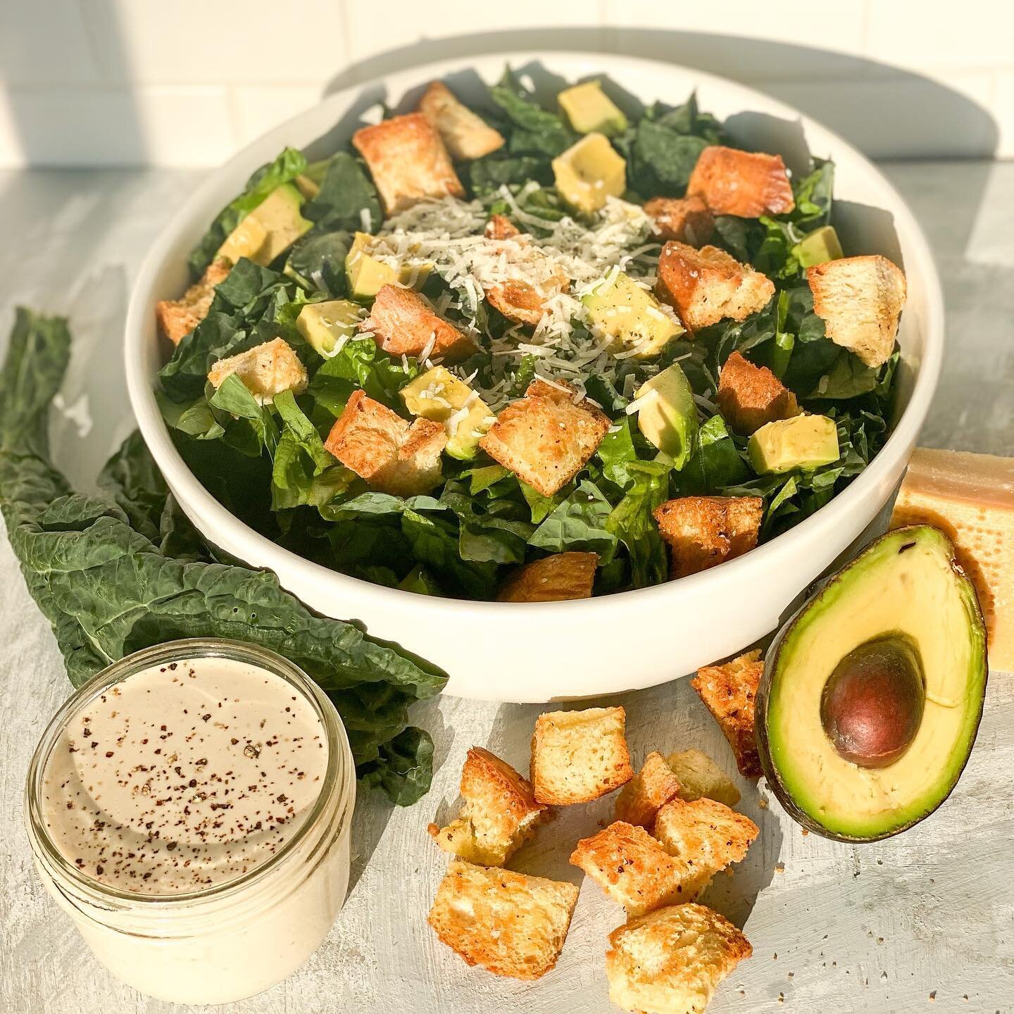 This Kale Avocado Caesar Salad with Homemade Caesar Dressing instantly transports you to Southern California! ☀️🥑 The Homemade Caesar dressing is accompanied by warm, homemade croutons, a ripe hass avocado, and freshly grated Parmigiano-Reggiano to 